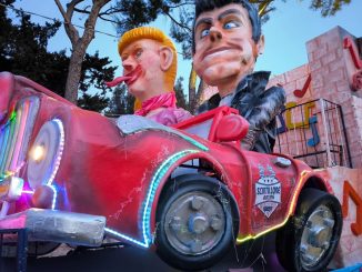 Carnevale, Sant’Eraclio, Foligno, Gabbia di Fuoco, carri allegorici, cartapesta, scuole, volontari, tradizione, sfilata, festa, bambini, cultura, rione Badia, gastronomia